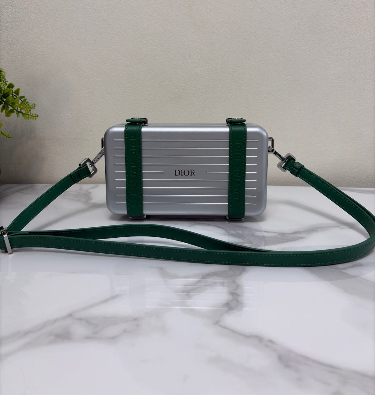 CHRISTIAN CROSS-BODY CLUTCH (GREEN STRAP)
